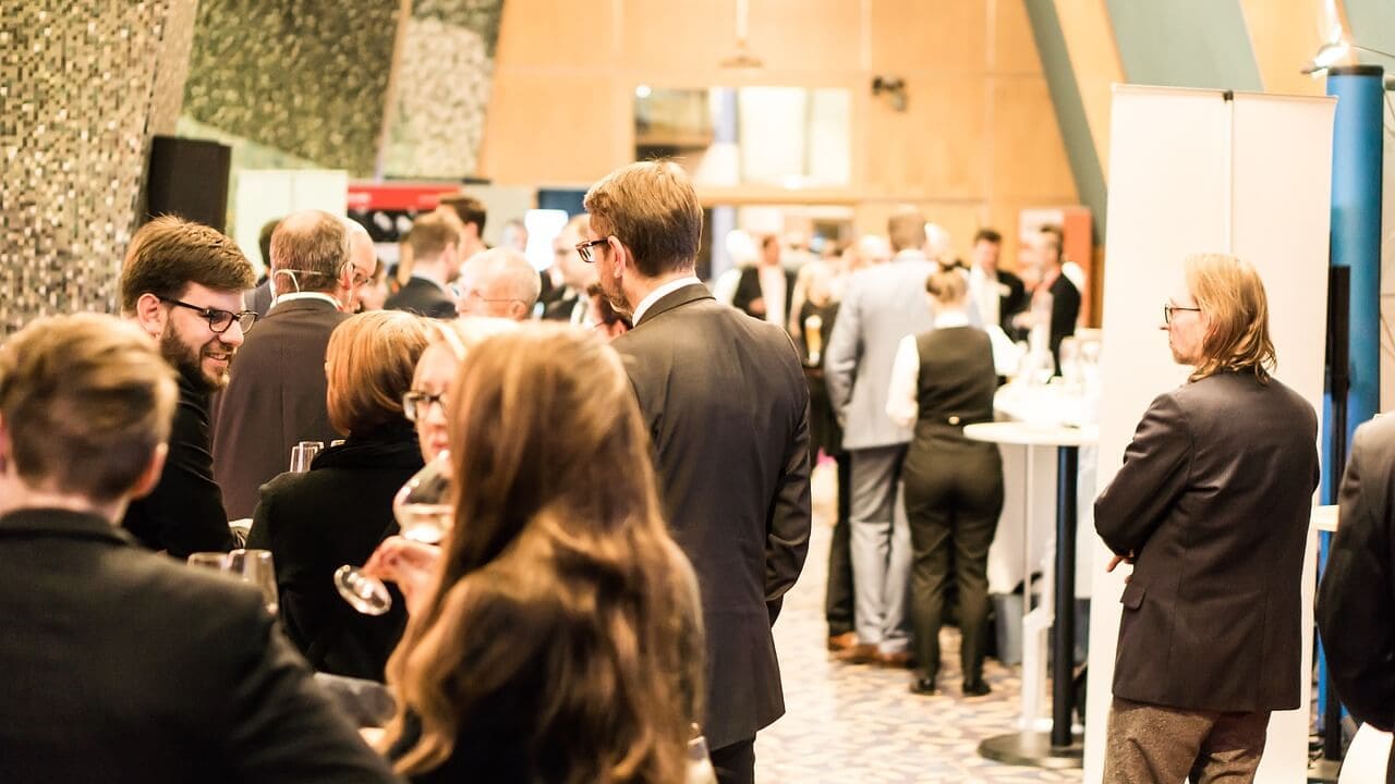 A diverse group of professionals networking at the Health Tourism Conference & Exhibition 2025.jpg